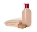 Bottle of shampoo and terry towel on white background Royalty Free Stock Photo