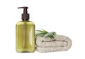 Bottle of shampoo and terry towel on white background Royalty Free Stock Photo