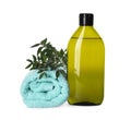 Bottle of shampoo and terry towel on white background Royalty Free Stock Photo