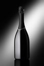 Bottle of sparkling wine on a black background Royalty Free Stock Photo