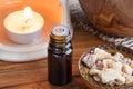 A bottle of styrax benzoin essential oil with benzoin resin and Royalty Free Stock Photo