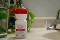 Bottle of Symtuza medication to treat HIV infection in bathroom at home. Chronic illness, modern medicine