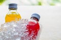 bottle with tasty drink in ice Royalty Free Stock Photo