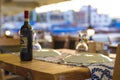 Bottle of wine with pictureque view of Kyrenia harbour in Cyprus