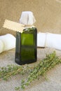 A bottle of thyme oil Royalty Free Stock Photo