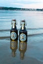 Bottle of two Flensburger Pilsener beers on the seashore Royalty Free Stock Photo
