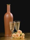 Bottle,two glass with wine and roses Royalty Free Stock Photo