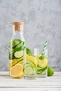 Bottle and two glasses with infused water Royalty Free Stock Photo