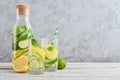 Bottle and two glasses with infused water Royalty Free Stock Photo