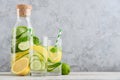 Bottle and two glasses with infused water Royalty Free Stock Photo