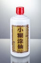 Bottle of typical strong chinese liquer isolated on gradient background.