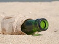 Bottle from under beer in paper Royalty Free Stock Photo