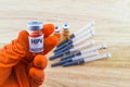 Bottle vaccine of Human papillomavirus (HPV) vaccine in red glo Royalty Free Stock Photo