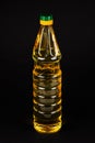 Bottle vegetable oil on black background