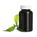 Bottle for vitamin pills and green leaves Royalty Free Stock Photo