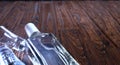 Bottle vodka tequila gin on wooden table with copy space. View from above. Selective focus, close up