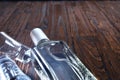 Bottle vodka on wooden table with copy space. View from above