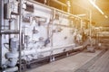 Bottle washing sterilization machine. Glass bottle washing line in a brewery. Royalty Free Stock Photo