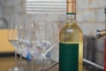 A bottle of white wine and empty wine glasses. Royalty Free Stock Photo