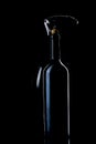 Bottle of wine on a black background.