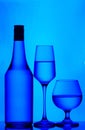 Bottle, wine and cognac glasses Royalty Free Stock Photo