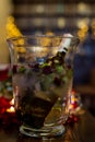 Vertical close-up photo of a bottle of wine that is being cooled in an ice bucket Royalty Free Stock Photo