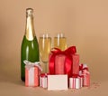 Bottle and wine glasses with gifts Royalty Free Stock Photo