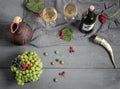 A bottle of wine, grapes and wine in a jug and glasses Royalty Free Stock Photo