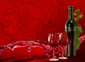 Bottle, wineglass, grapes and dynamics splash wine Royalty Free Stock Photo