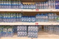 Bottled drinking water on supermarket shelves Royalty Free Stock Photo