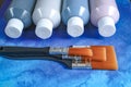 Bottles with acrylic paint with brushes, handmade, hobby and decoration Royalty Free Stock Photo