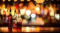 Bottles of alcoholic drinks against a blurred background on a bar counter Royalty Free Stock Photo