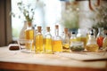 bottles of aromatic natural oils on wooden table