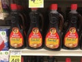 Bottles of Aunt Jemima Butter Rich pancake syrup on grocery shelf Royalty Free Stock Photo