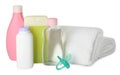 Bottles of baby cosmetic products, towels and pacifier on white background Royalty Free Stock Photo