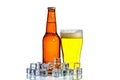 Bottles of beer and glass getting cool in ice cubes on white Royalty Free Stock Photo