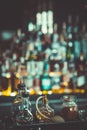 Bottles with Bitters and infusions on bar counter