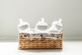 Bottles for breast milk in a wicker basket