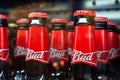 MINSK, BELARUS - December 13, 2019: Bottles of Bud beer in refrigerator of supermarket close up. Royalty Free Stock Photo