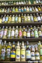 bottles of cachaca on a shelf, inside a shop in the historic city of Paraty