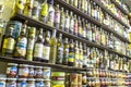 bottles of cachaca on a shelf, inside a shop in the historic city of Paraty