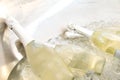 Bottles of champagne in cold ice cubes Royalty Free Stock Photo