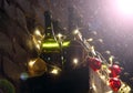 Bottles of champagne prepared for New Year. Supply of champagne and Christmas balls