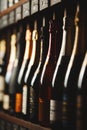 Bottles of champagne on the shelf, close-up image of alcoholic beverages in the wine cellar. Close-up image. Royalty Free Stock Photo