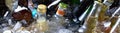 Bottles of cold drinks in the barrel with ice in the hot summer day Royalty Free Stock Photo