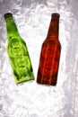 Bottles with cold drinks can be alcohol, juice, soda, water are inside cooler surrounded by ice
