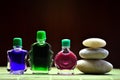 Bottles with colored aroma oils Royalty Free Stock Photo