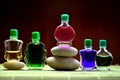 Bottles with colored aroma oils Royalty Free Stock Photo