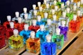 Bottles of colored perfume