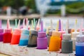 Bottles of colored powder, various colors Royalty Free Stock Photo